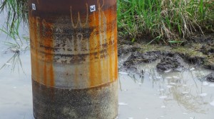 Aging utility pole exposed to corrosive water